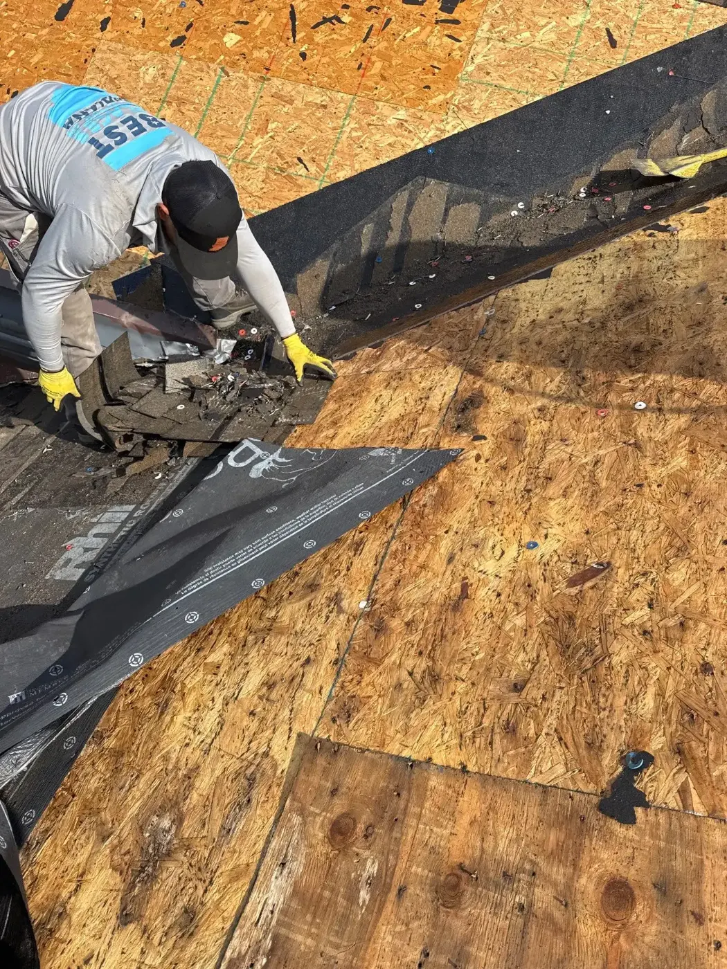 Tarping and dry-in on a Demotte commercial roof